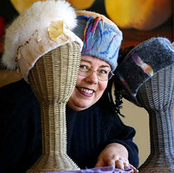 Vicki Dodge and some of her felted hats